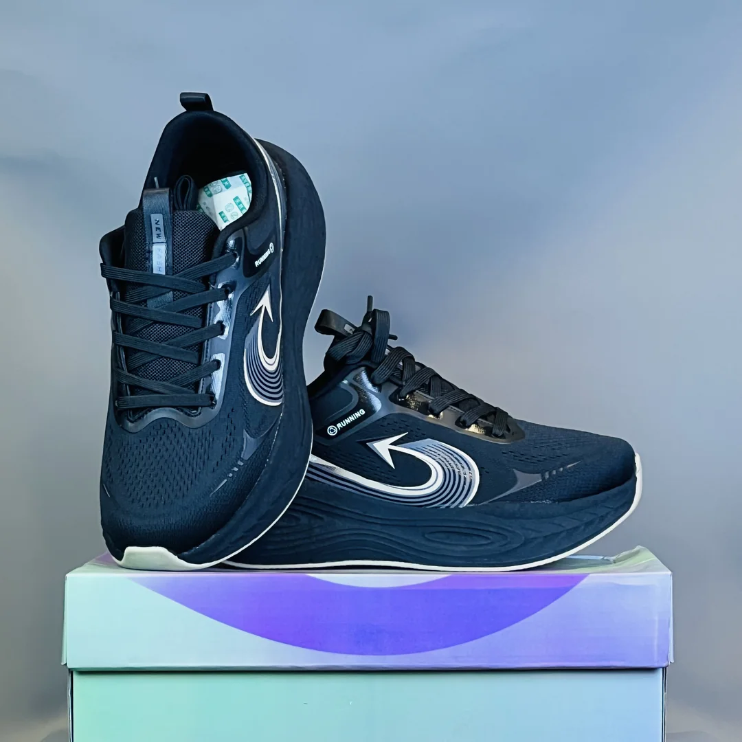 All-Black Dynamic Swirl Cushion Running Shoes